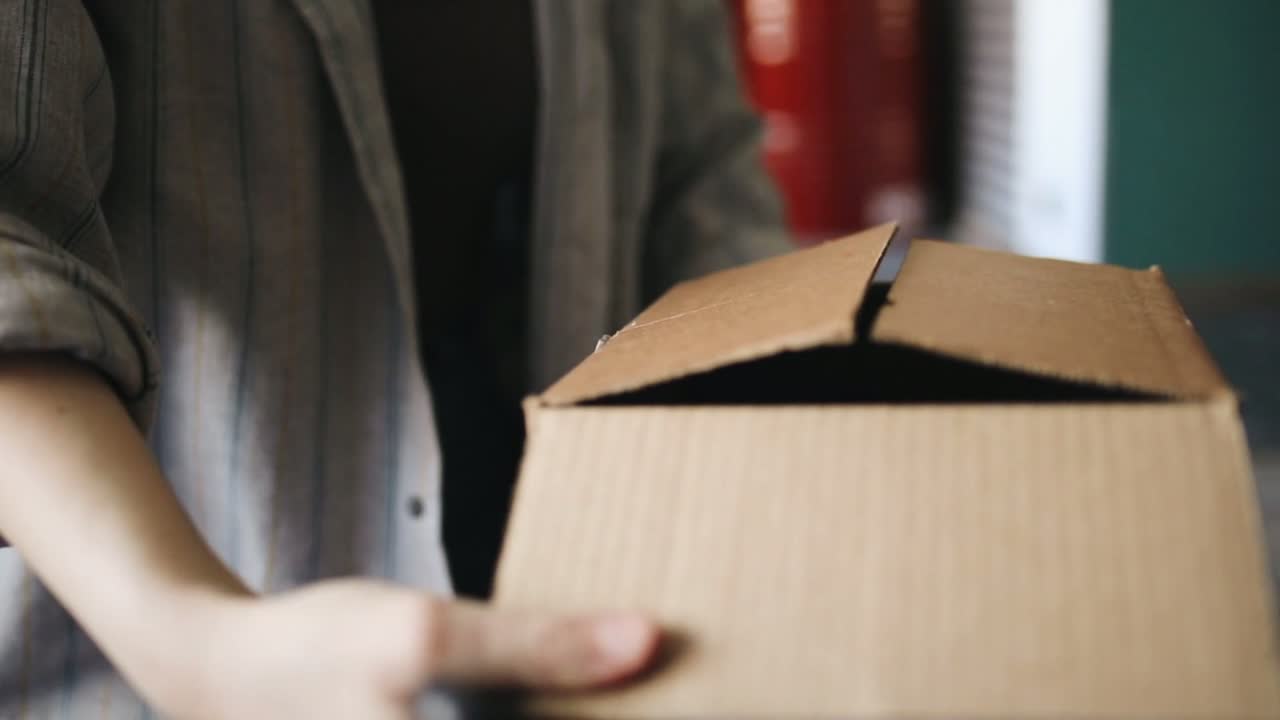Original frame showing an open carton